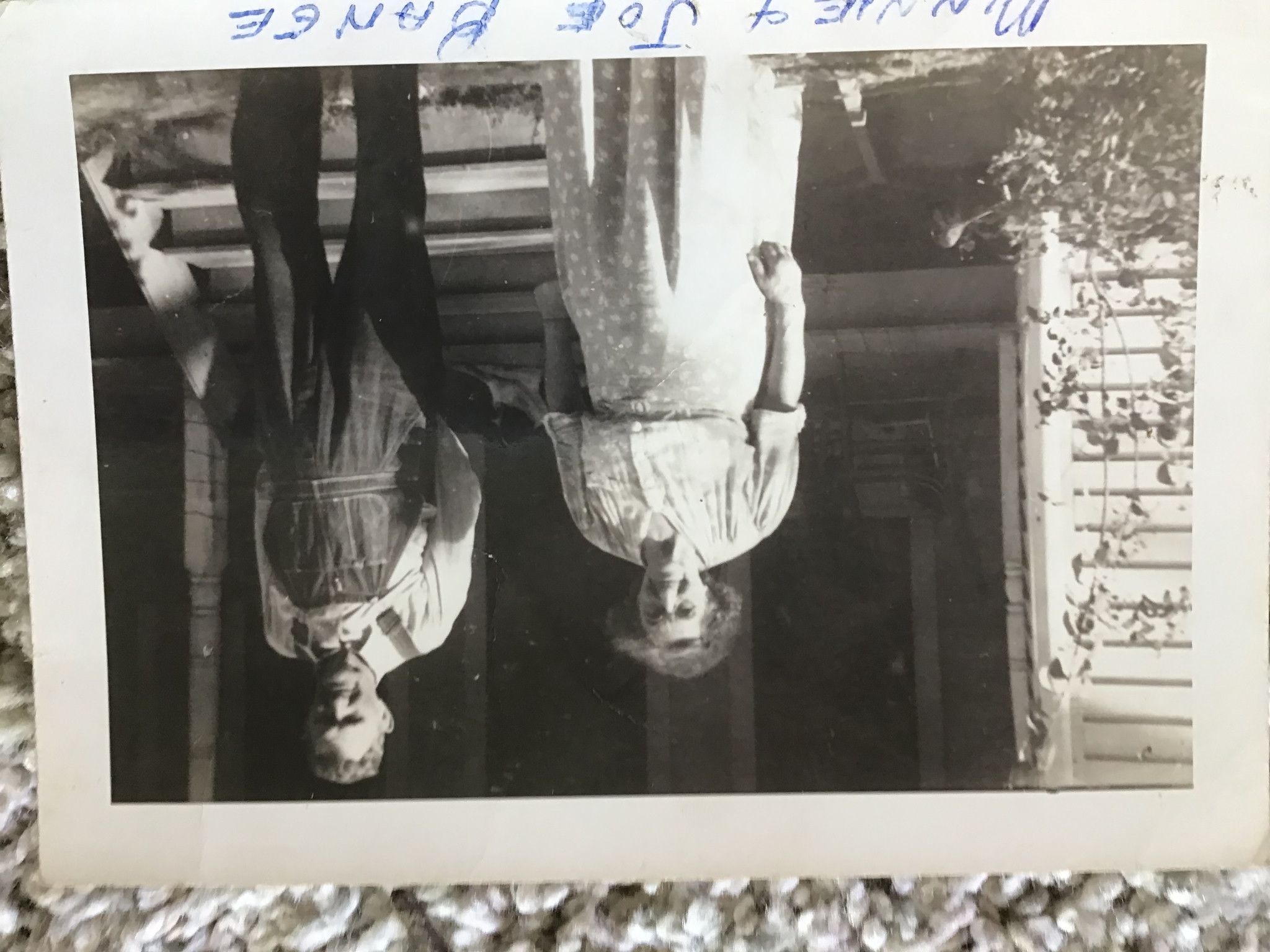 Wilhelmina (Minnie) and Joseph (Joe) Bange on a porch.