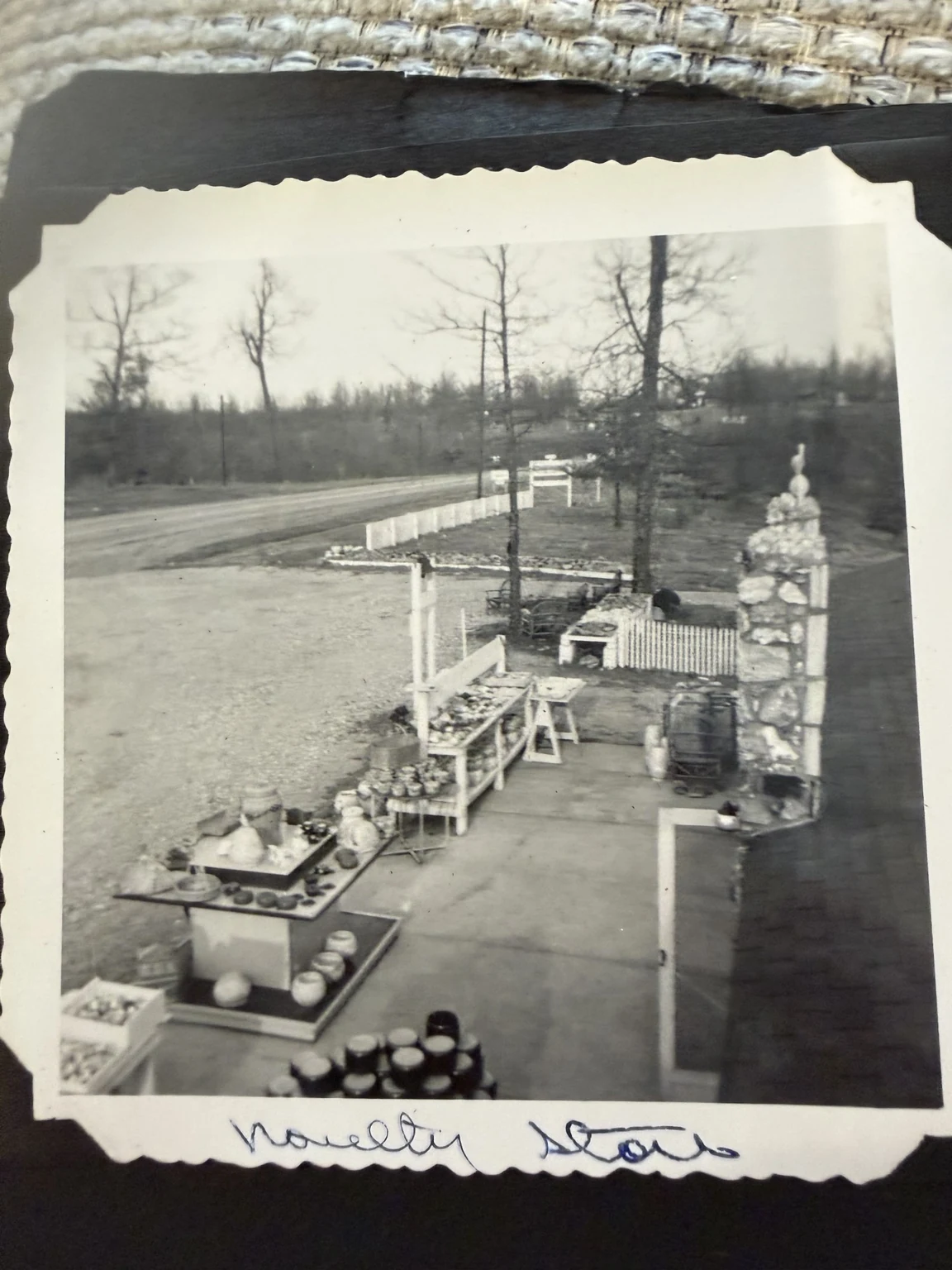 “Novelty store” (original caption). A roadside display of goods. The business, town and exact date are unconfirmed.