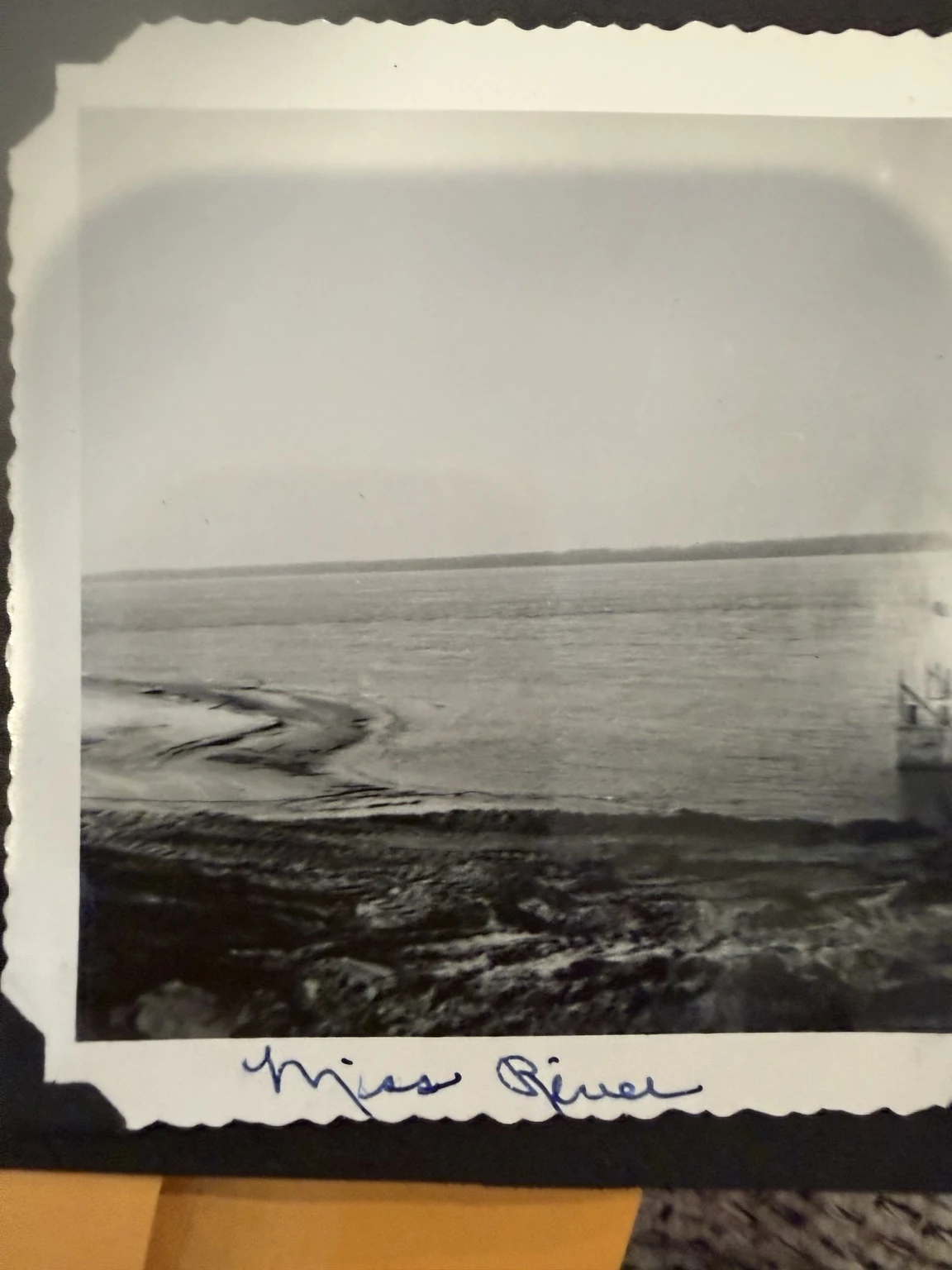 “Miss River” (original caption). A view across the river from the shore. Exact viewpoint and date are unconfirmed.