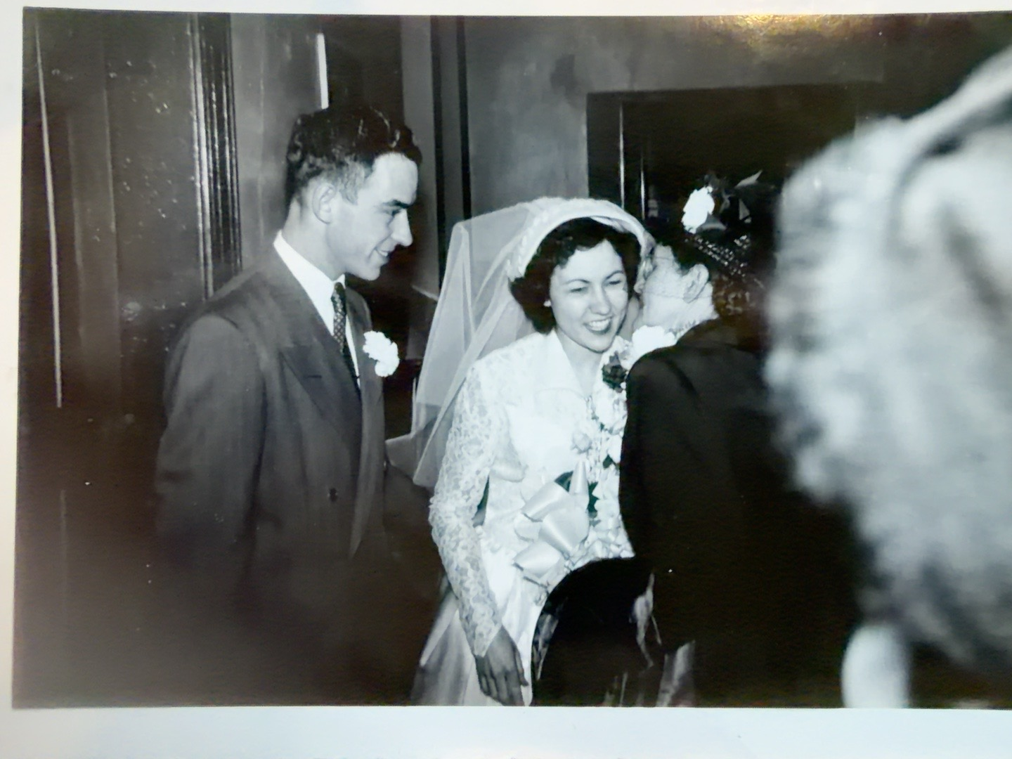 Bob and Bridget Roling and Barbara Morrison, named on the matching reverse. A woman greets the bride as the groom stands beside her.